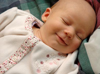 Why Do Babies Smile in Their Sleep?